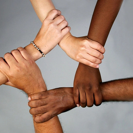 Hands of different colors representing tolerance